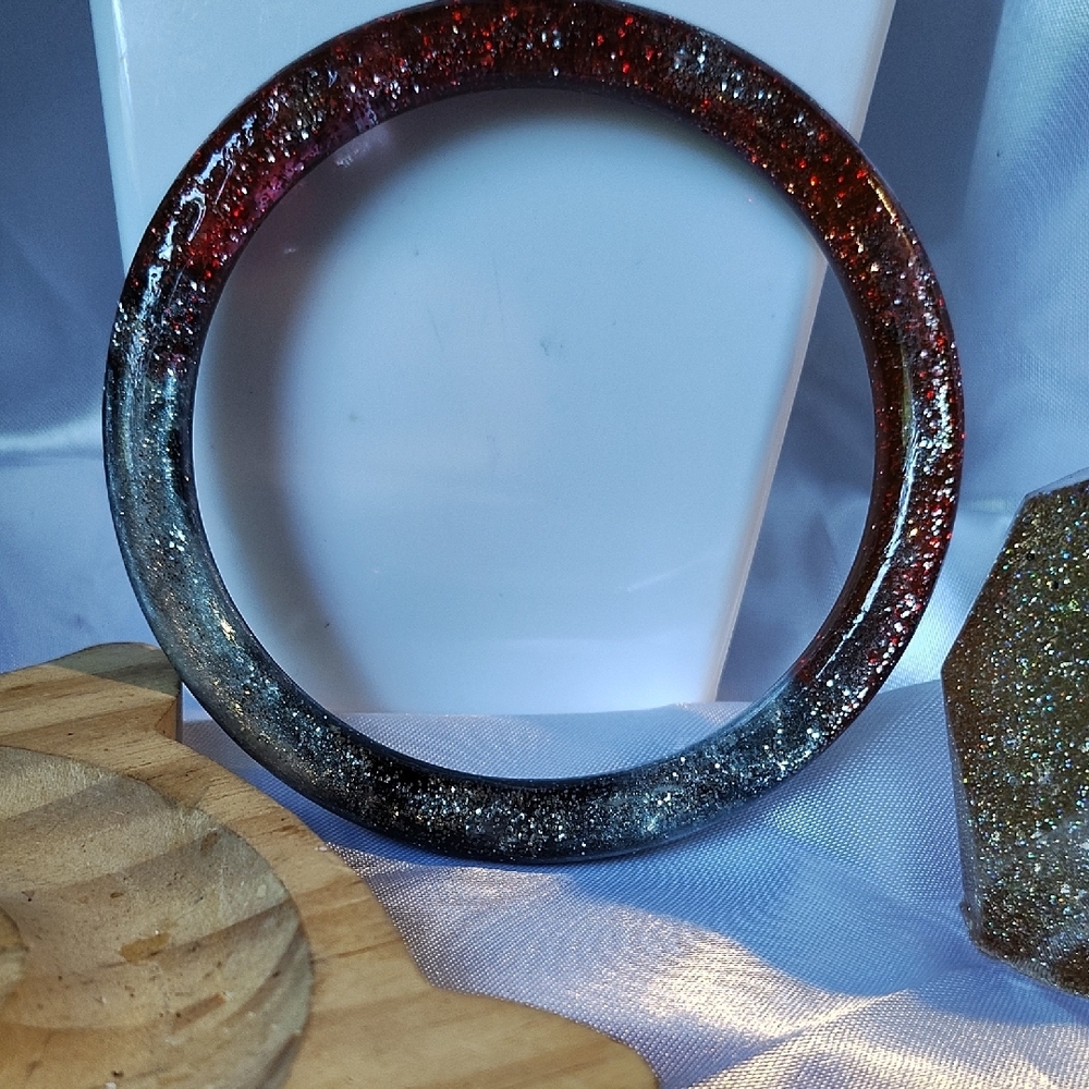 Red and Black Textured Bangle Bracelet with Vintage Charm.